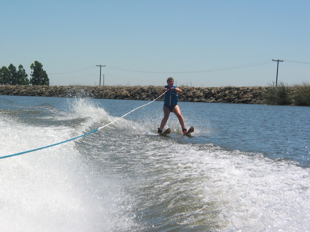 Janice water skiing.  She 'is outside the boat wake.
